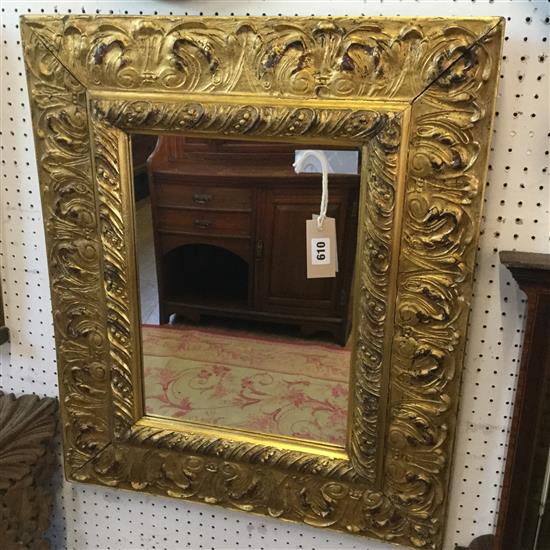 Antique mirror with foliate-moulded frame